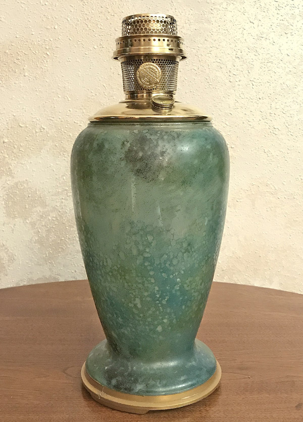 The aladdin 12 inch variegated verde vase lamp was manufactured in